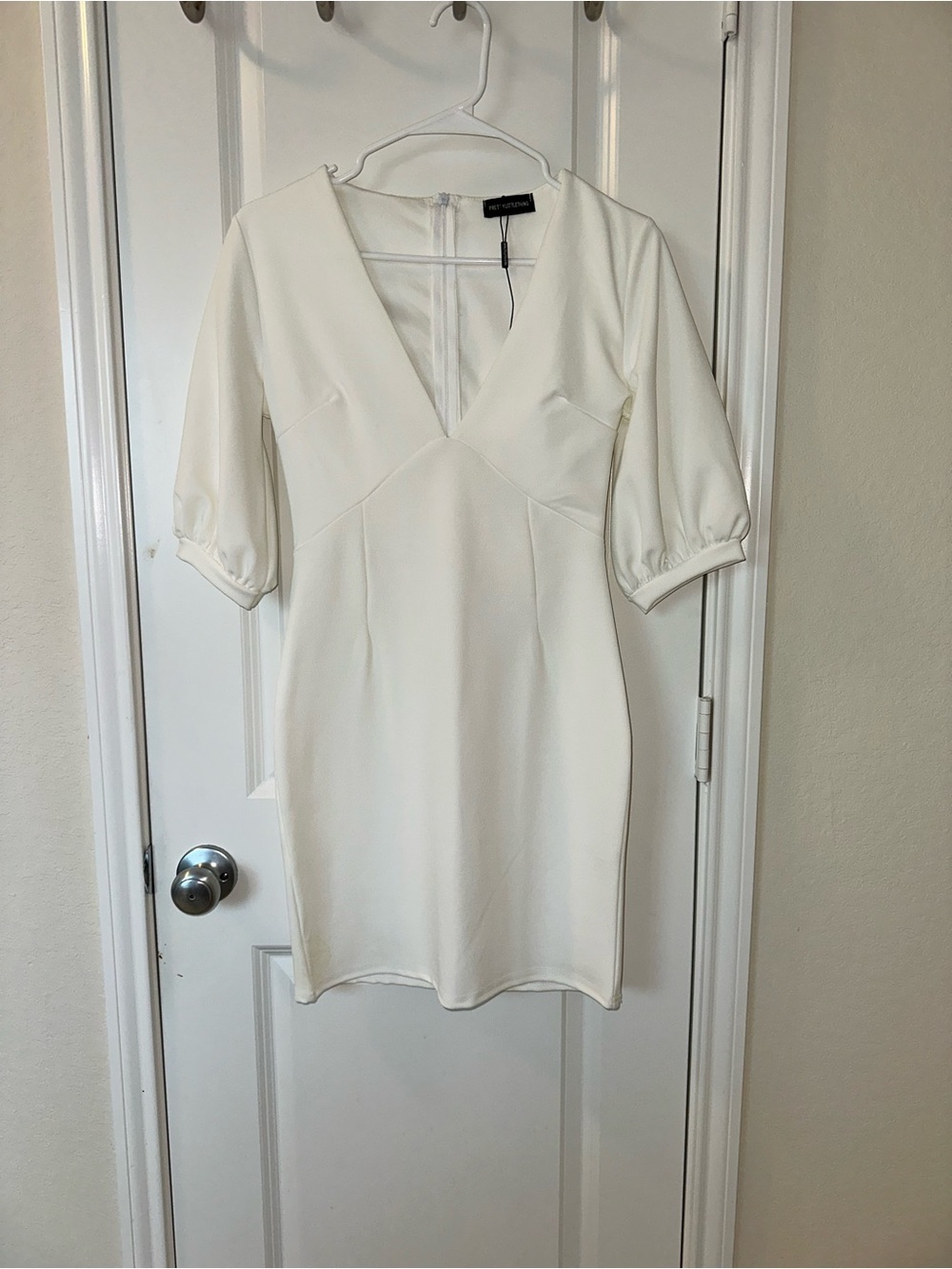 PrettyLittleThing Cream V‑Neck Puff Sleeve Mini Dress